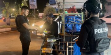 Sat Reskrim Polresta Banda Aceh Bagikan Makan Sahur ke Warga Membutuhkan