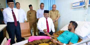 Pj. Gubernur Aceh Kunjungi Atlet Paralayang yang Terluka di PON XXI